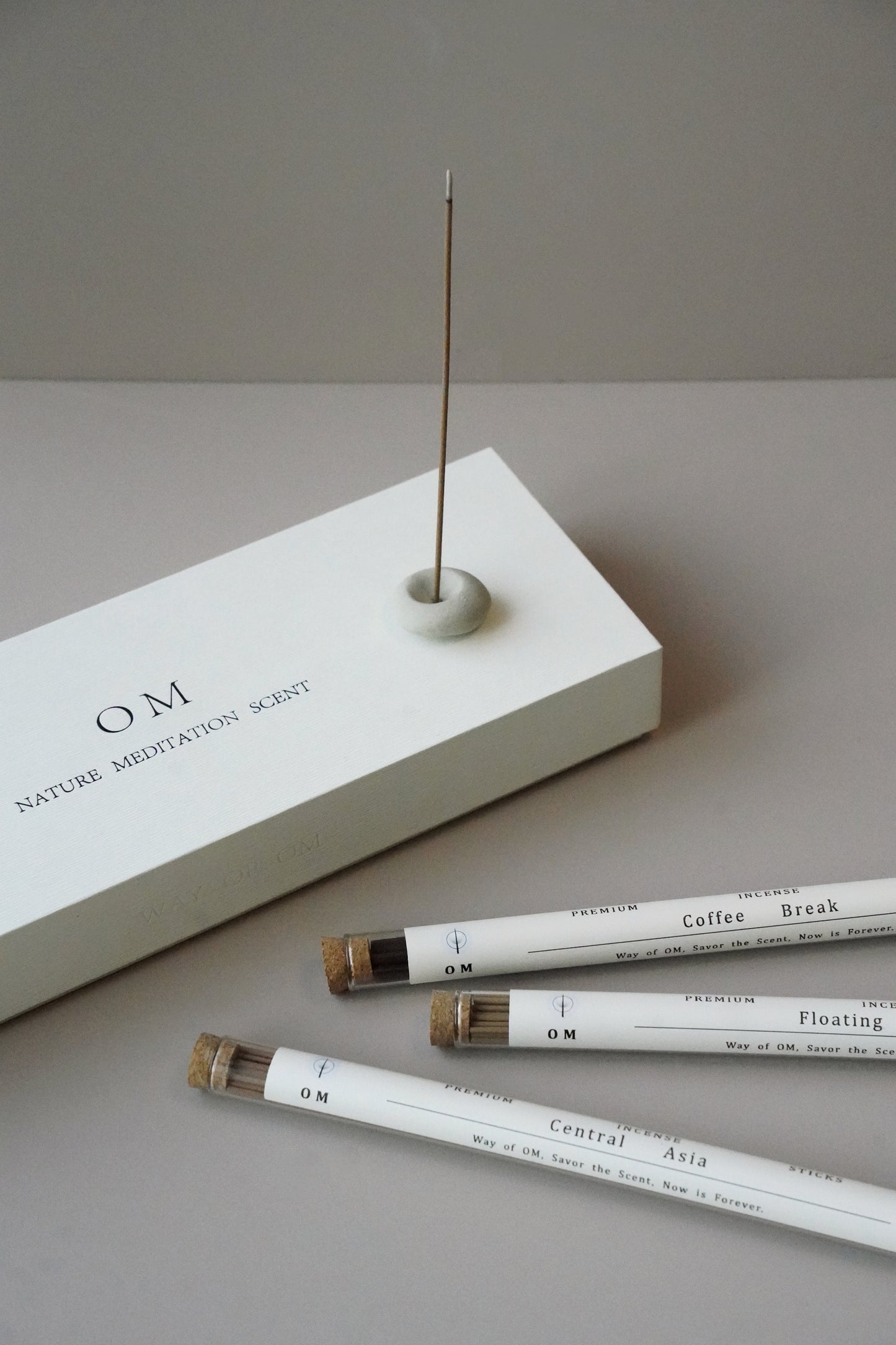 Detail of incense stick tubes and OM branded box – refined home fragrance