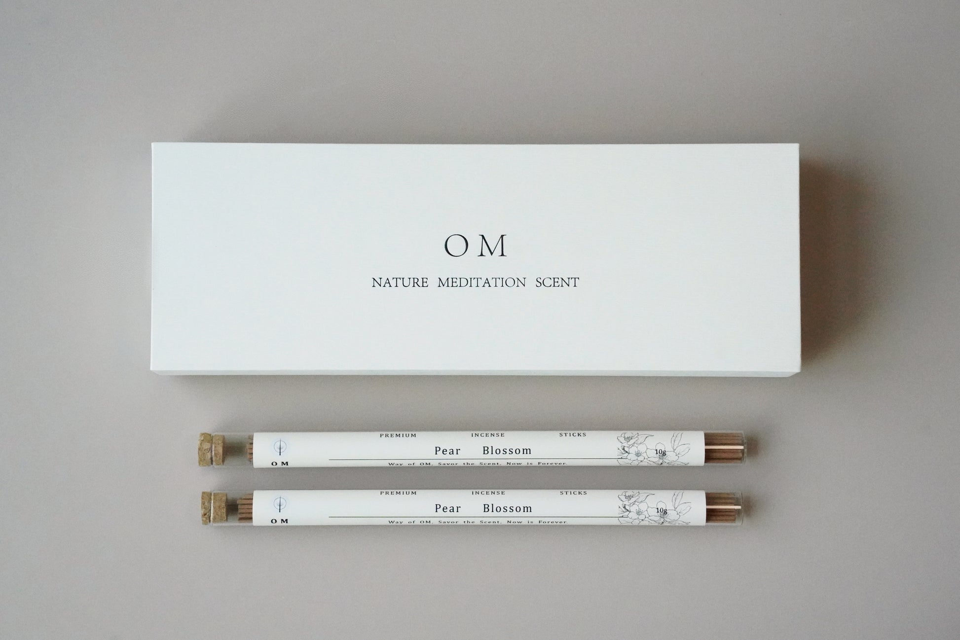 OM Pear Blossom incense 50-stick set with white box and delicate pear-scented incense tubes