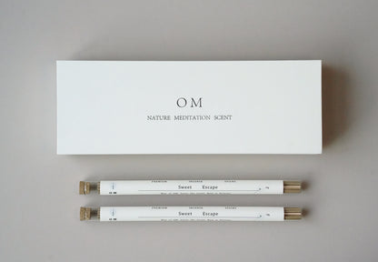 OM natural incense 50-stick set with elegant white box and floral-inspired scent tubes – minimalist presentation